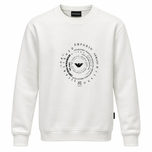Off-white Emporio Armani sweatshirt with a dark circular lettering graphic and central eagle emblem.