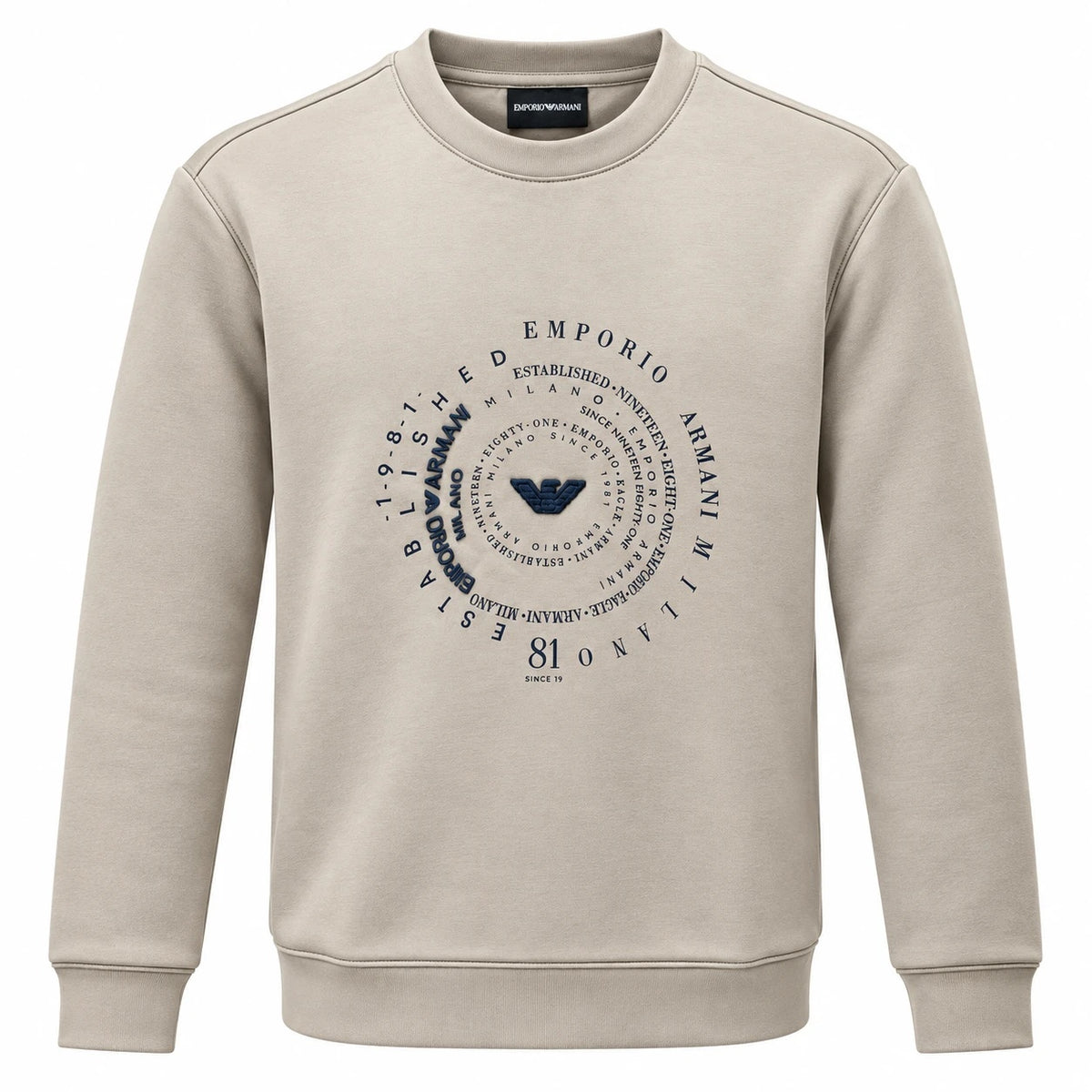 Beige Emporio Armani crewneck sweatshirt with a dark navy circular graphic and central eagle emblem.
