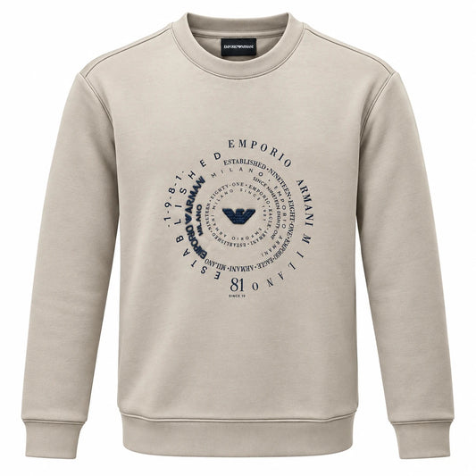 Beige Emporio Armani crewneck sweatshirt with a dark navy circular graphic and central eagle emblem.