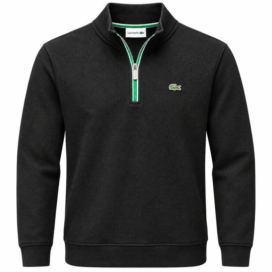 Black Lacoste quarter-zip sweatshirt with green-and-white zipper trim and a green crocodile chest emblem.