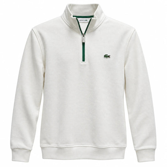 White Lacoste quarter-zip sweatshirt with green zip trim and crocodile chest patch, front view