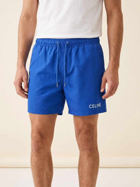 MODEL·CELINE — Logo Swim Shorts - Royal Blue