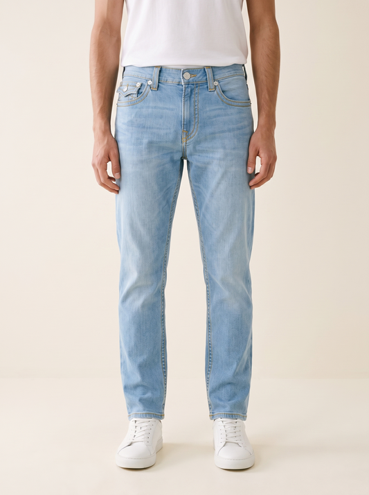 MODEL·TRUE RELIGION — Gold Stitch Light Wash Denim